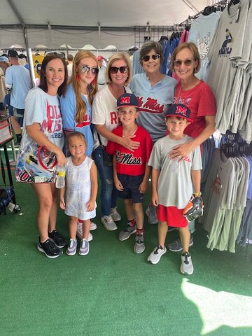 Caroline Dees Sledge, Mattie Sledge, Mary Montgomery Mars, Mandy Dees, Levi                           Dees, Cheryl Mars, Gray Sledge and Lynn North all traveled to Omaha to cheer on the Rebels in the College World Series.